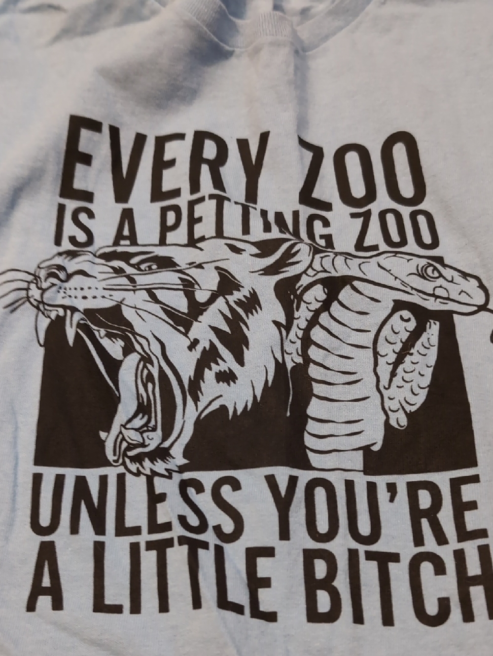 Every Zoo Is A Petting Zoo Light Blue Tee with Black Reptile & Big Cat Graphic
